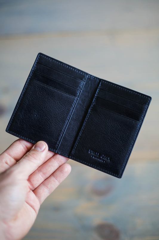 6 SLOT BIFOLD (black veg tan/ gold lizard leather)