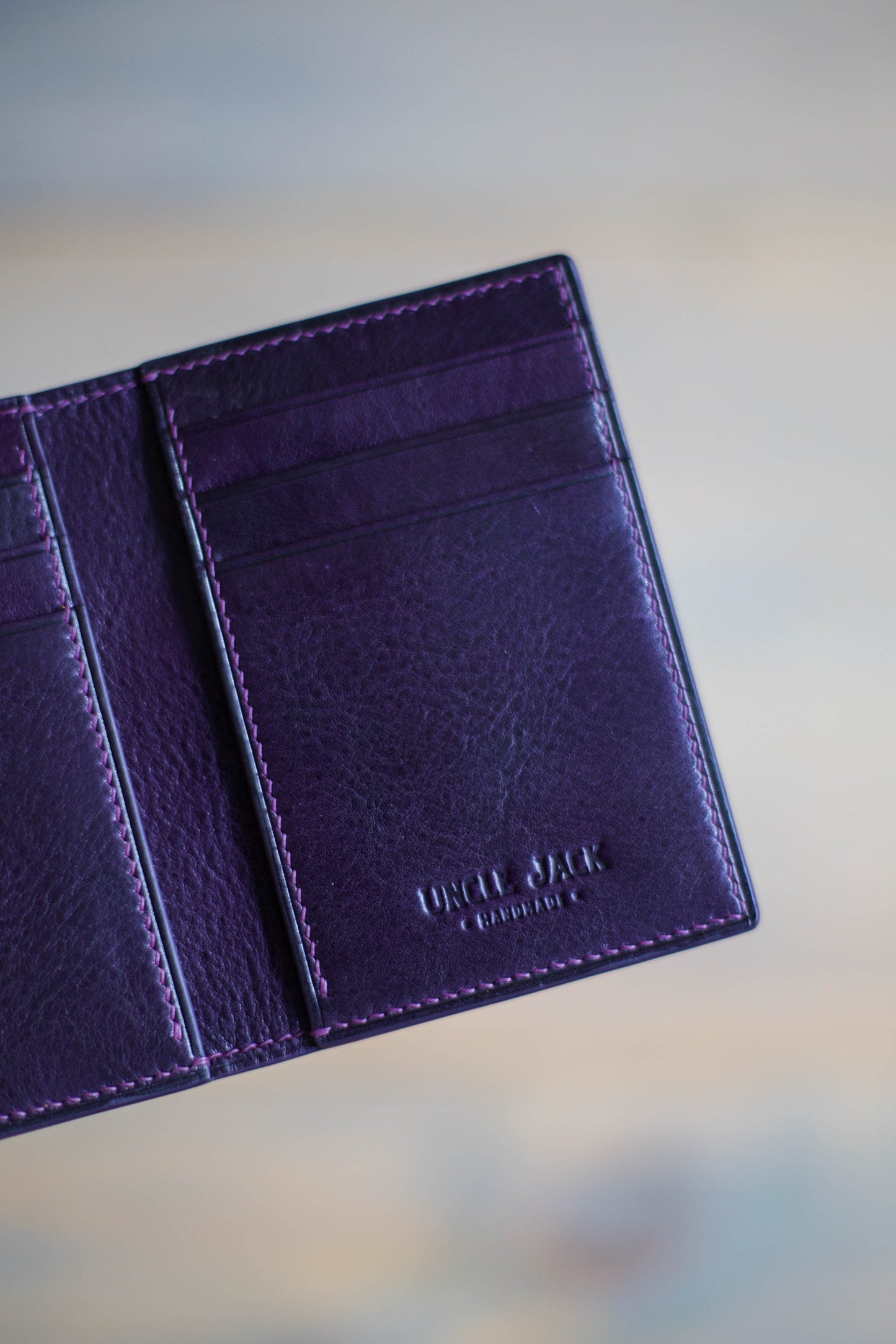 6 SLOT BIFOLD (purple veg tan/ magenta lizard leather)