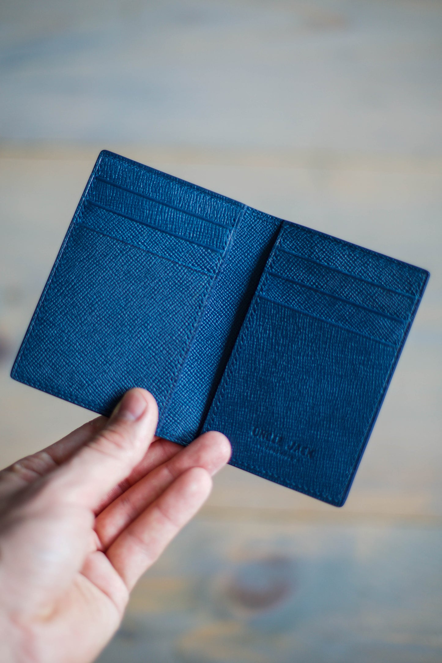 6 SLOT BIFOLD (blue saffiano leather)