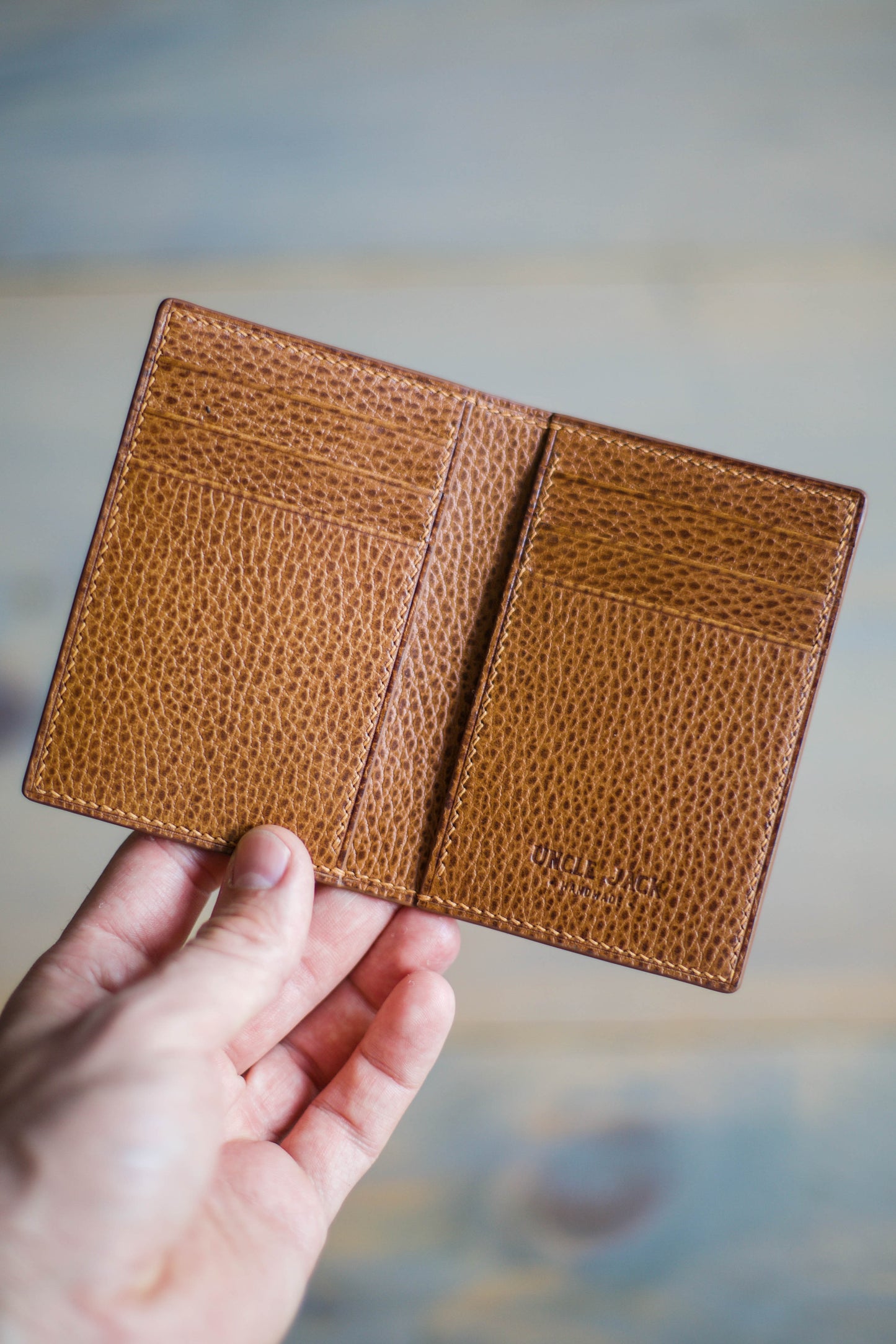 6 SLOT BIFOLD (whiskey dollaro/ natural python leather)