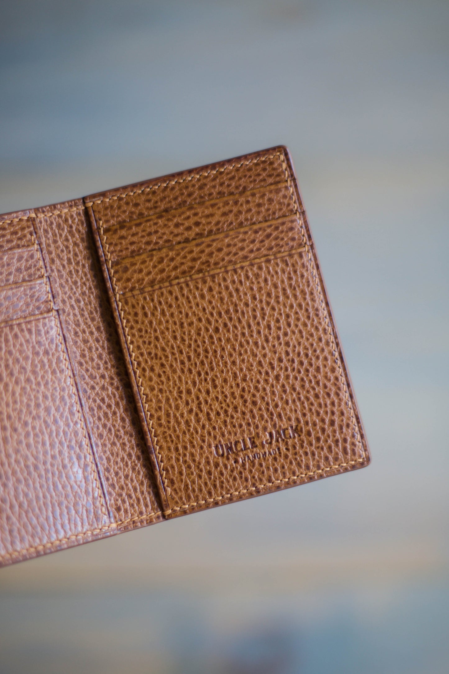 6 SLOT BIFOLD (whiskey dollaro/ natural python leather)