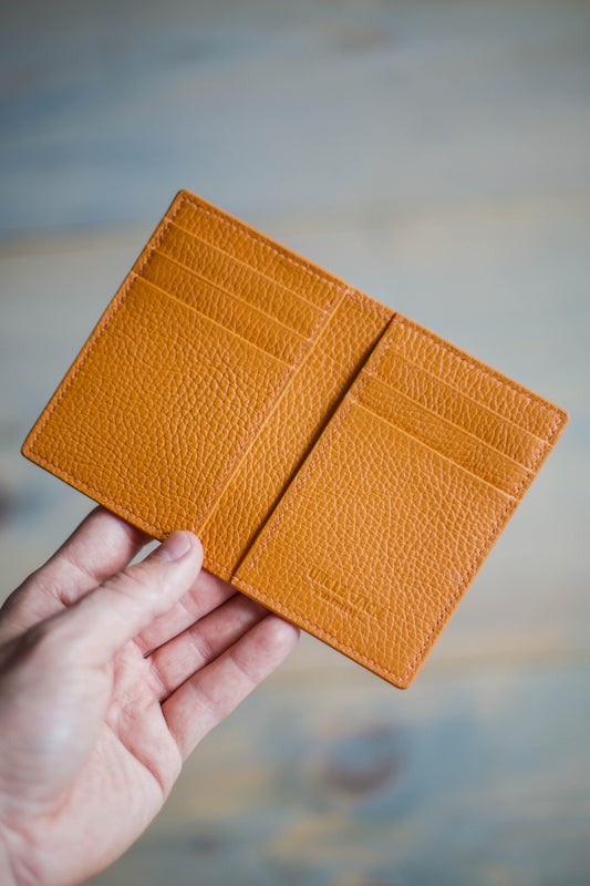 6 SLOT BIFOLD (orange pebbled leather)