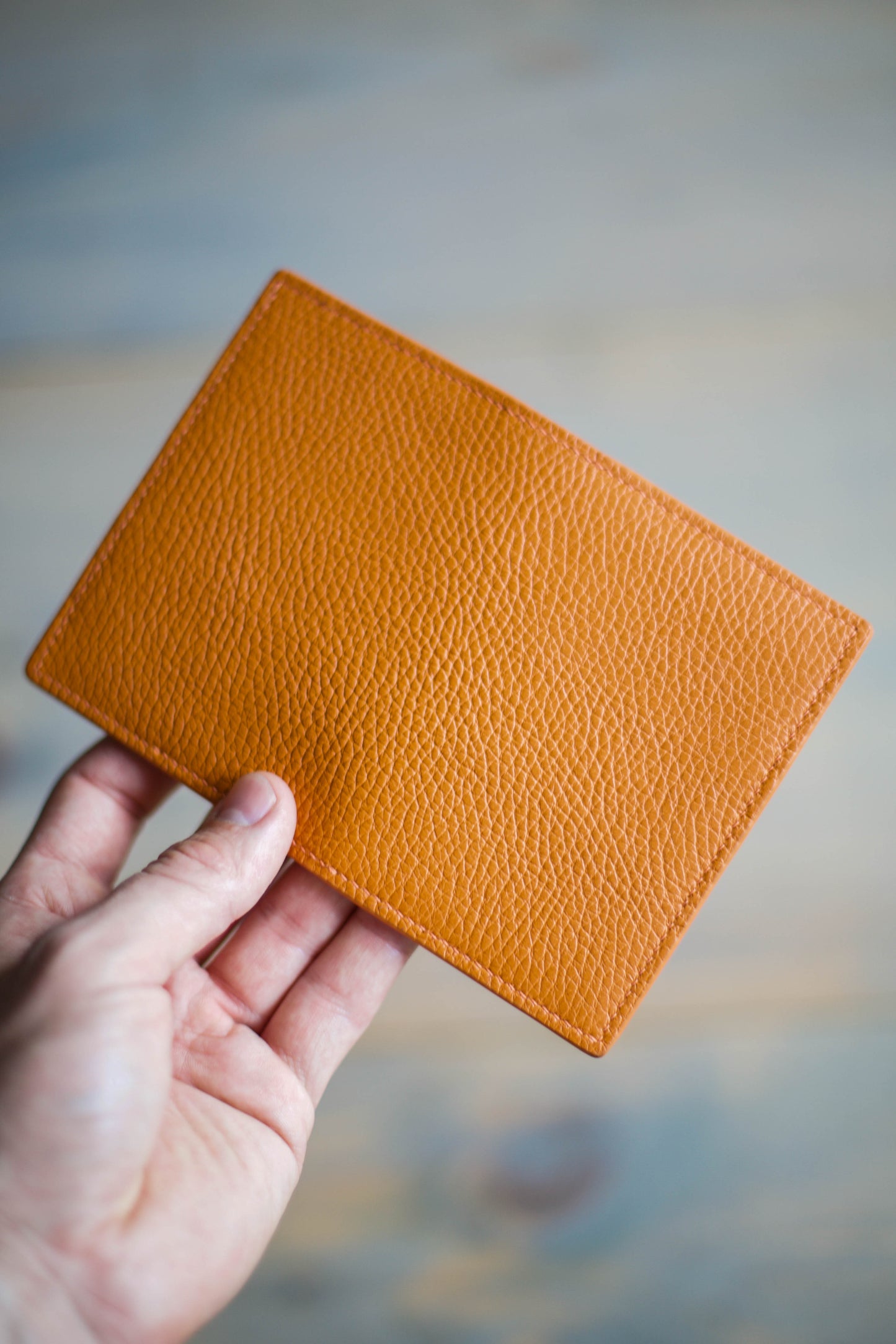 6 SLOT BIFOLD (orange pebbled leather)