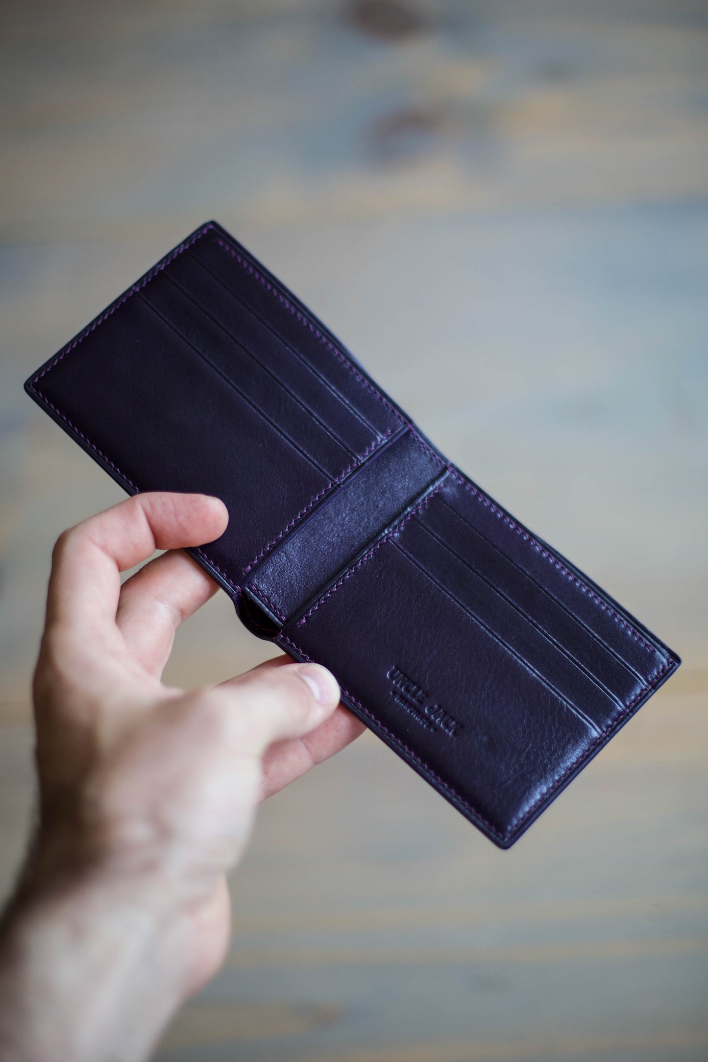 6 SLOT BIFOLD (purple veg tan/ magenta lizard leather)