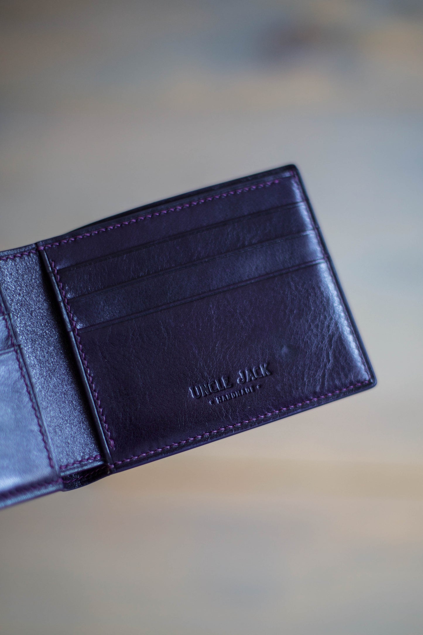 6 SLOT BIFOLD (purple veg tan/ magenta lizard leather)