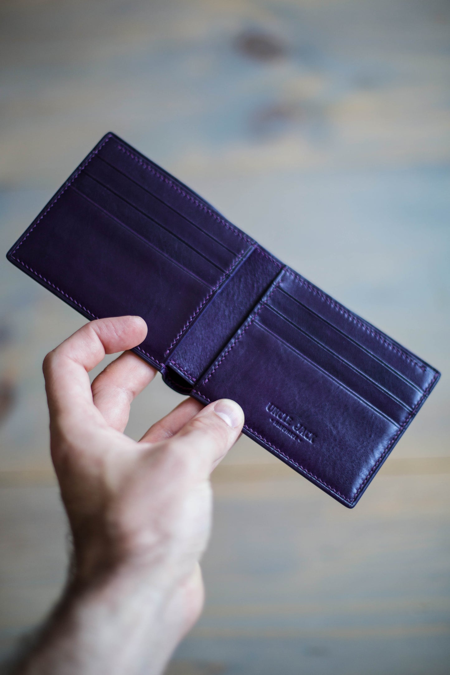 6 SLOT BIFOLD (purple veg tan leather)