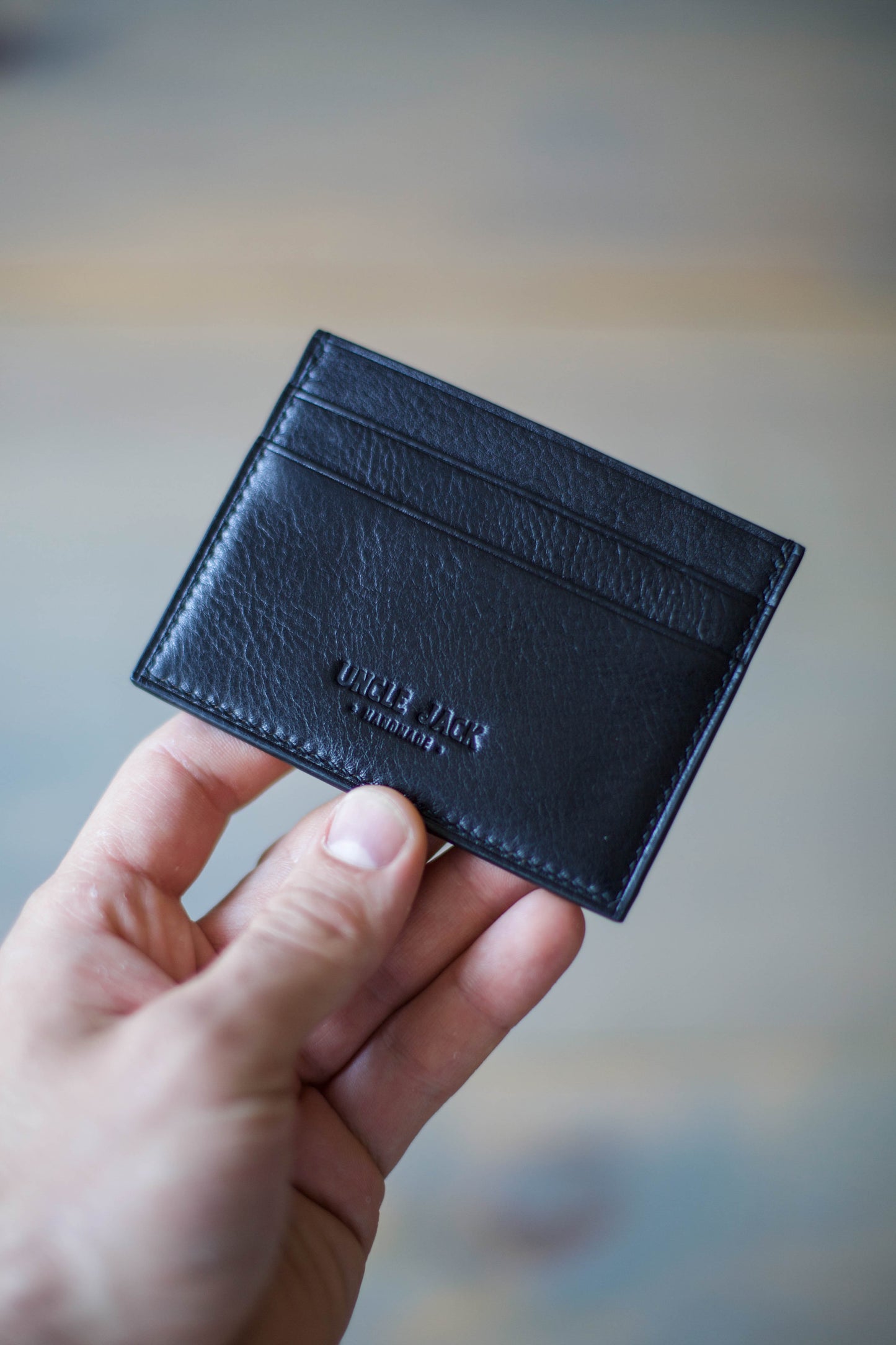 5 POCKET CARDHOLDER (shiny black veg tan leather)