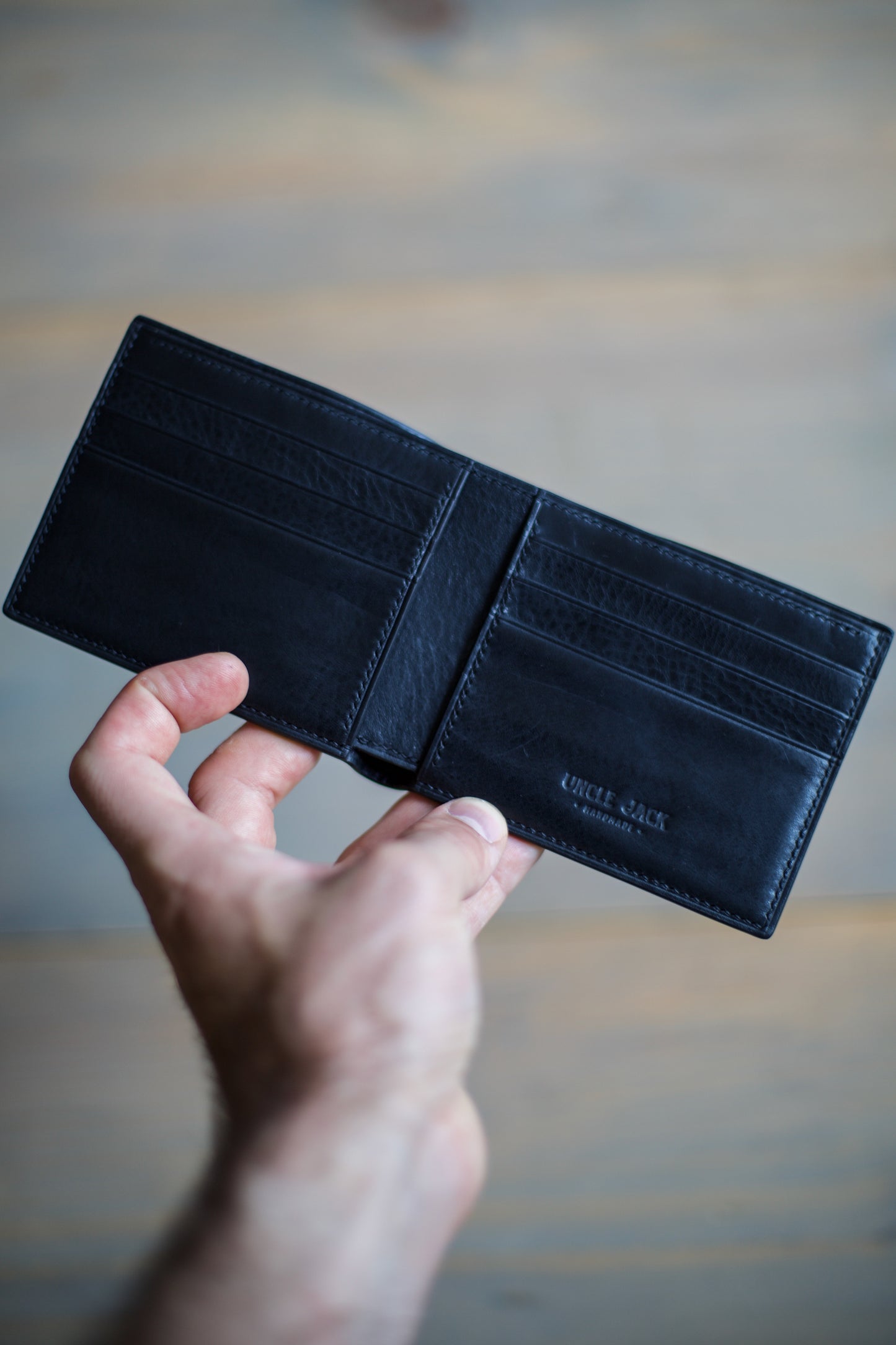 6 SLOT BIFOLD (black veg tan/ light blue lizard)