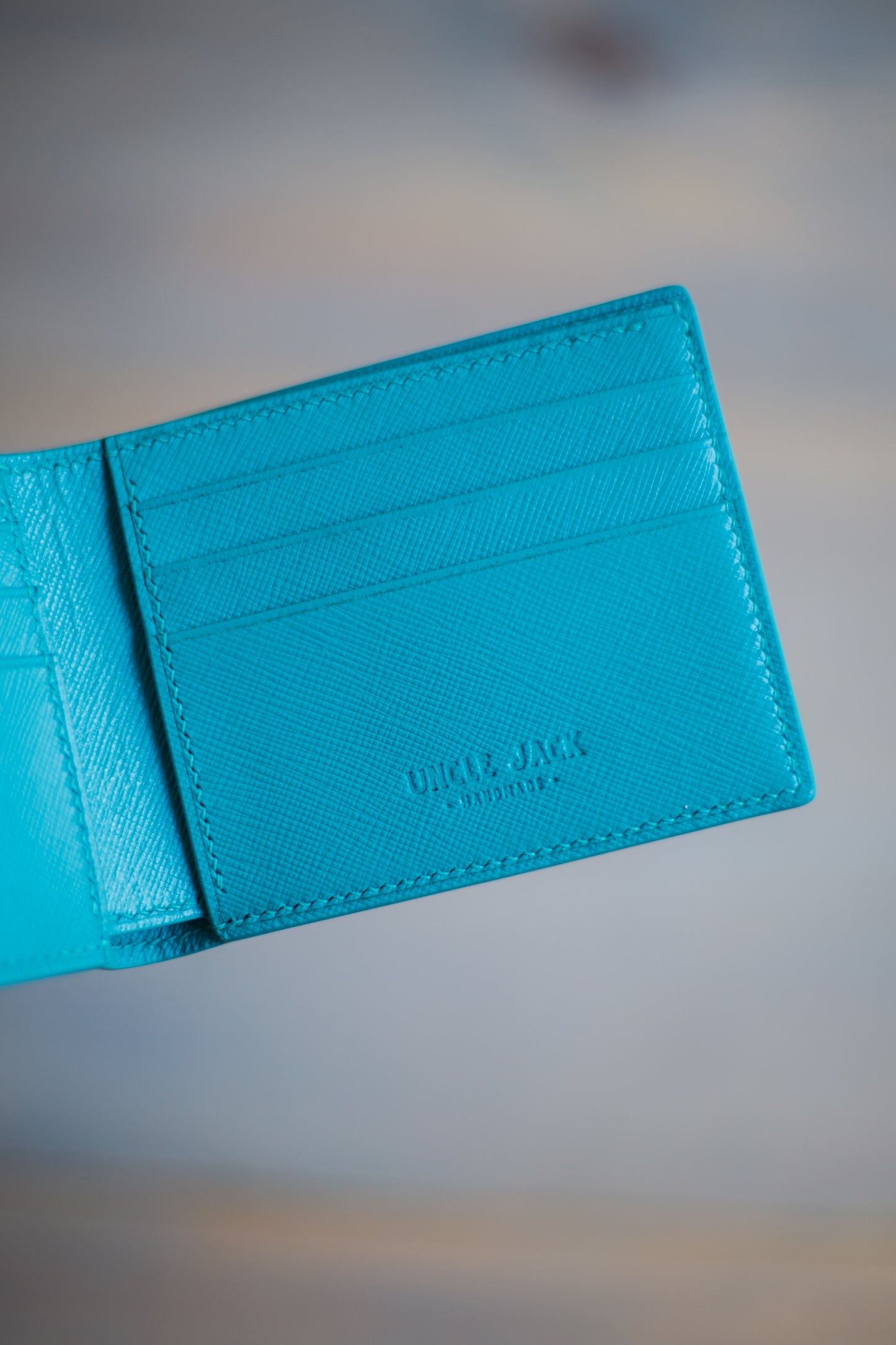 6 SLOT BIFOLD (turquoise saffiano leather)