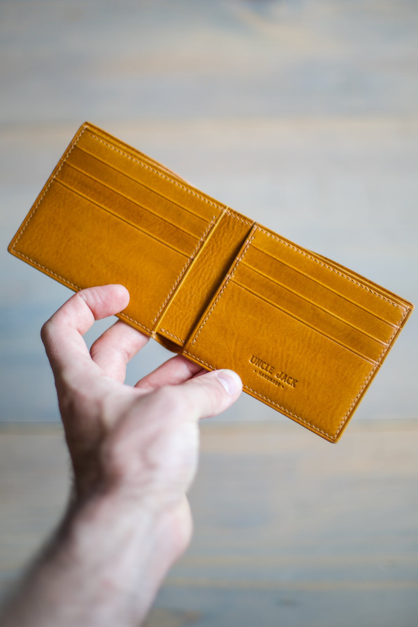 6 SLOT BIFOLD (orange veg tan/ natural lizard leather)