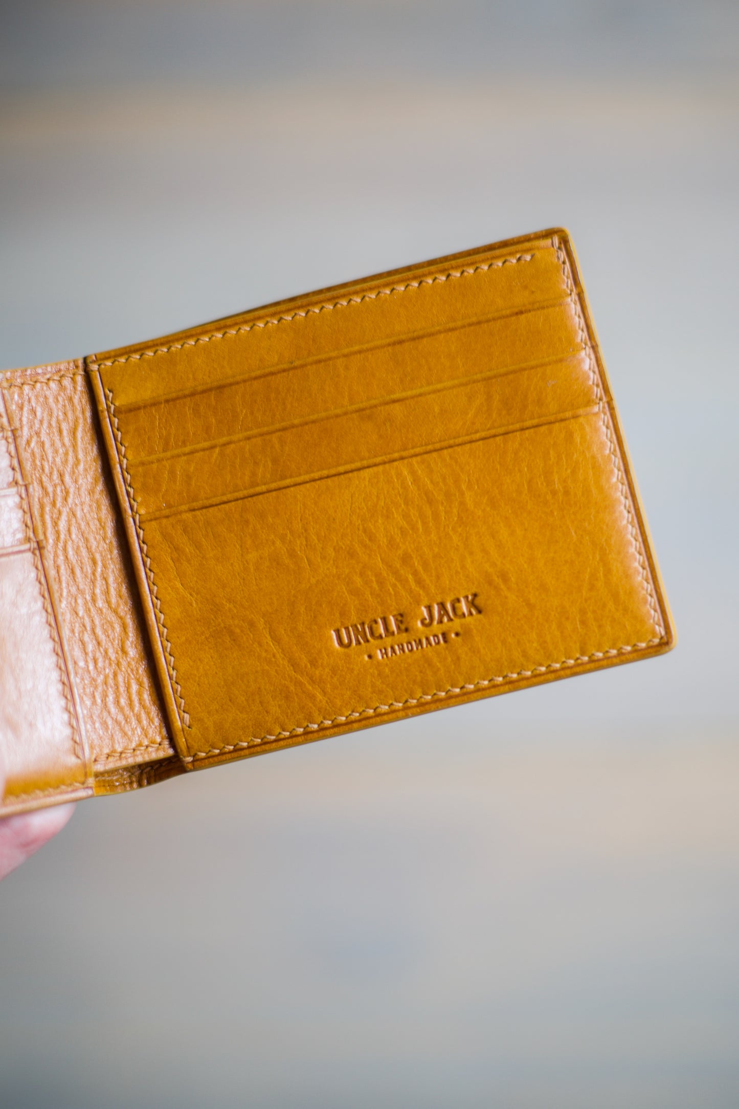 6 SLOT BIFOLD (orange veg tan/ natural lizard leather)